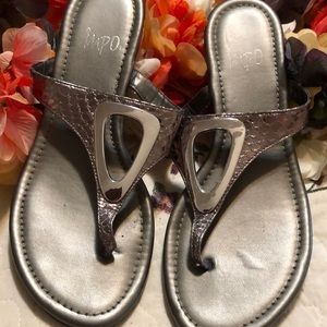 Silver sandal flip flop style with wedge heel